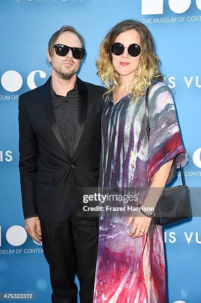 Artists Sterling Ruby and Melanie Schiff attend the 2015 MOCA Gala presented by Louis Vuitton at The Geffen Contemporary at MOCA on May 30, 2015 in...