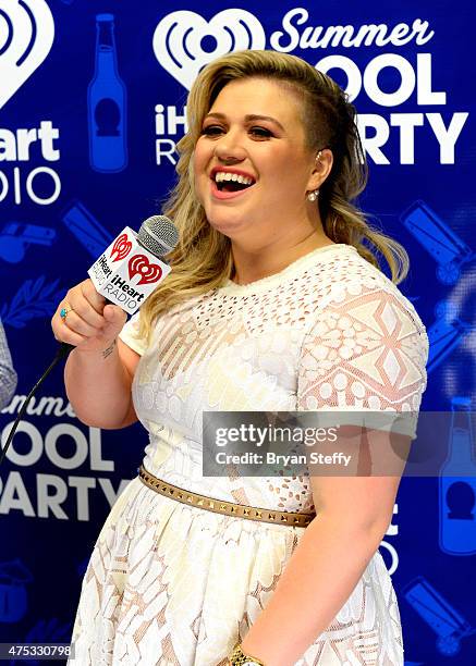 Recording artist Kelly Clarkson attends The iHeartRadio Summer Pool Party at Caesars Palace on May 30, 2015 in Las Vegas, Nevada.