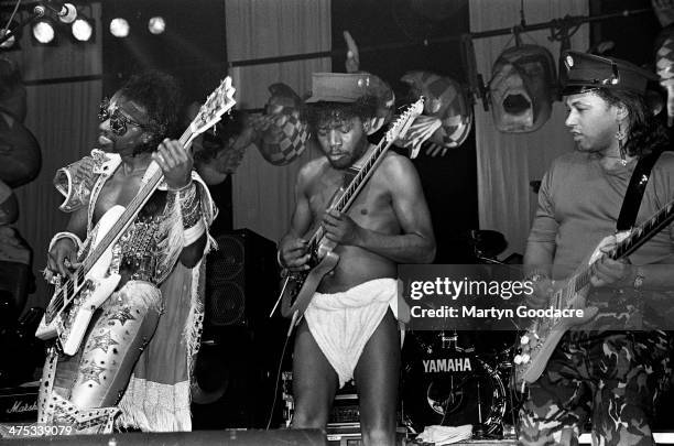 Bootsy Collins performs on stage with Bootsy's Rubber Band at Brixton Academy, London, November 1990. Bootsy Collins, Garry Shider, Michael Hampton.