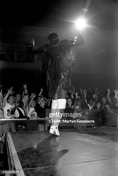 Bootsy Collins performs on stage with Bootsy's Rubber Band at Brixton Academy, London, November 1990.