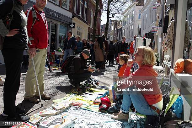 streetmarket at koningsdag in the city of haarlem - haarlem stock pictures, royalty-free photos & images