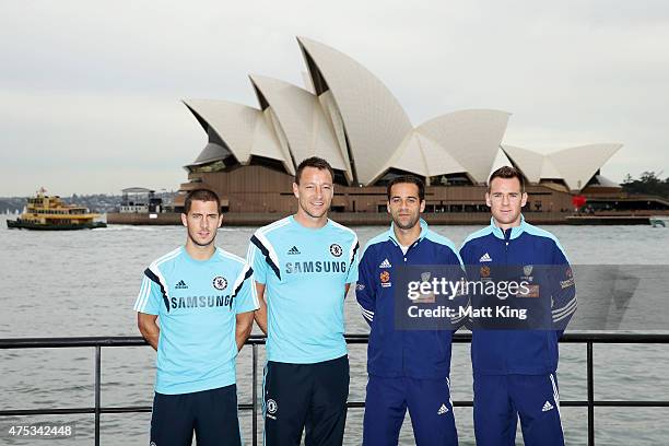 Eden Hazard and captain John Terry of Chelsea FC next to captain Alex Brosque and Shane Smeltz of Sydney FC pose during a photo opportunity after a...