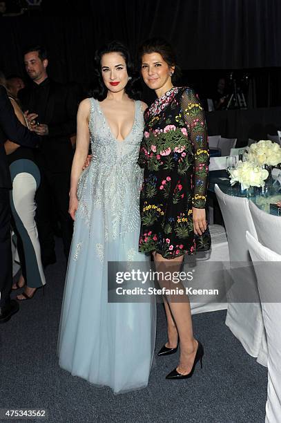 Actresses Dita Von Teese and Marisa Tomei attend the 2015 MOCA Gala presented by Louis Vuitton at The Geffen Contemporary at MOCA on May 30, 2015 in...