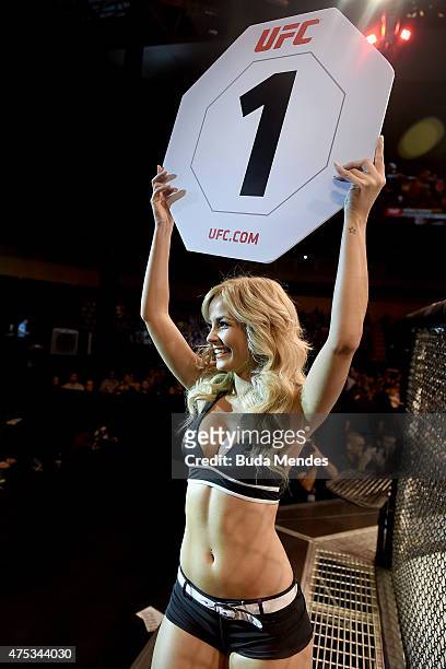 Octagon girl Jhenny Andrade introduces a round during the UFC Fight Night Condit v Alves at Arena Goiania on May 30, 2015 in Goiania.