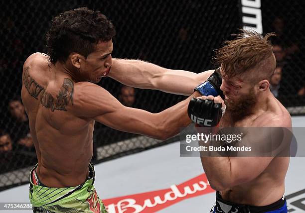 Charles Oliveira and Nick Lentz of the United States exchange punches in their featherweight UFC bout during the UFC Fight Night event at Arena...