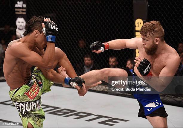 Charles Oliveira and Nick Lentz of the United States exchange kicks in their featherweight UFC bout during the UFC Fight Night event at Arena Goiania...