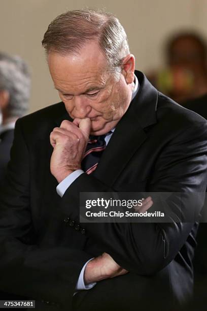 Bill O'Reilly, host of FOX News Channel's The O'Reilly Factor, waits for the arrival of U.S. President Barack Obama during an event about Obama's 'My...