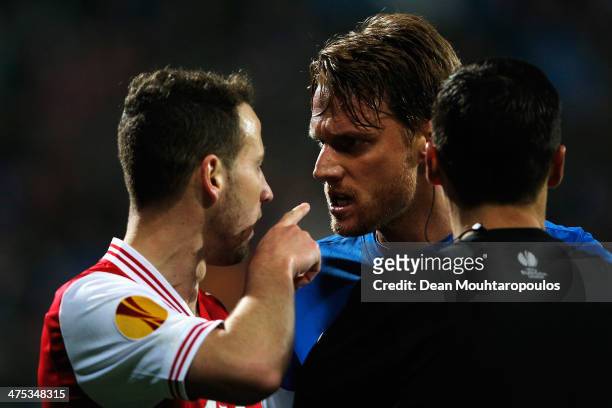 Roy Beerens of AZ points his finger in the face of Radoslav Kovac of Slovan Liberec after he reacts as referee, Serhiy Boiko looks on during the UEFA...