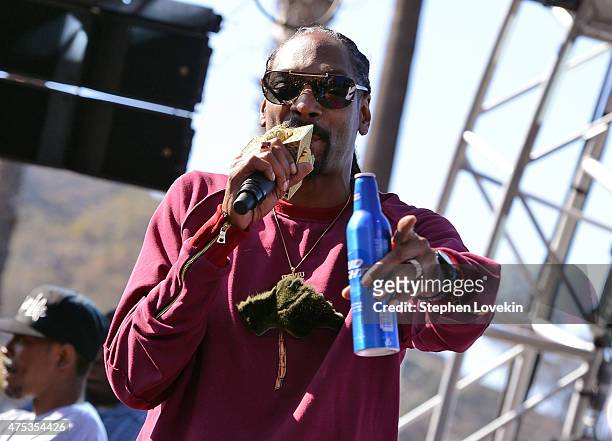 Rapper Snoop Dogg performs during Whatever, USA on May 30, 2015 in Catalina Island, California. Bud Light invited 1,000 consumers to Whatever, USA...