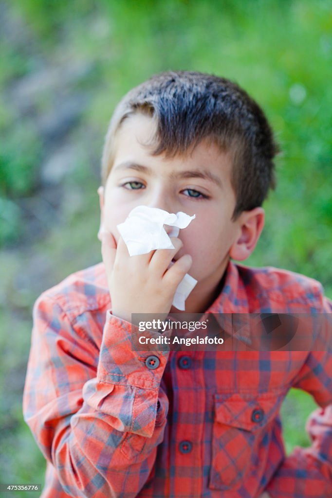 Child Blowing his Nose