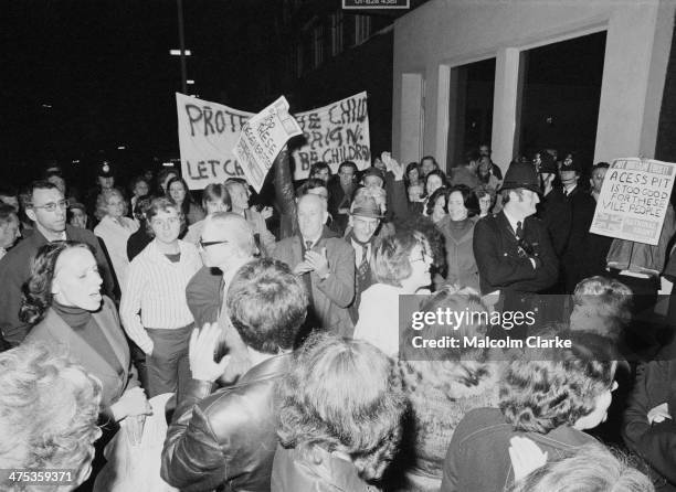 Protestors and police outside Conway Hall as the pro-paedophile activist group, the Paedophile Information Exchange holds its first open meeting,...