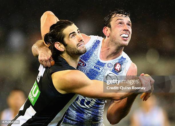 Brodie Grundy of the Magpies and Todd Goldstein of the Kangaroos contest for a mark during the round nine AFL match between the Collingwood Magpies...