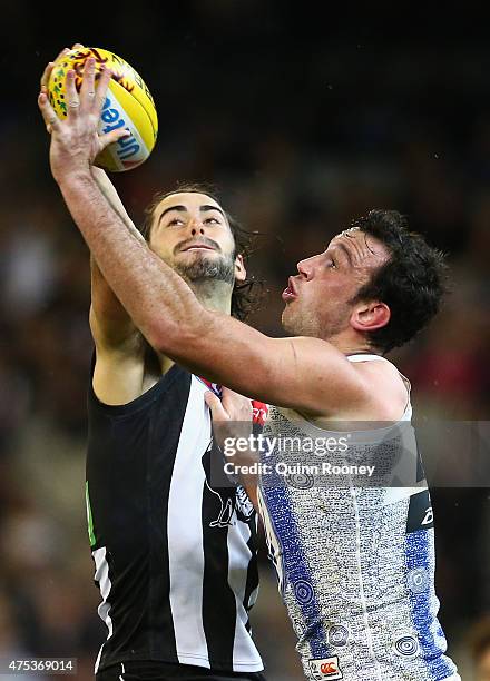 Brodie Grundy of the Magpies and Todd Goldstein of the Kangaroos compete in the ruck during the round nine AFL match between the Collingwood Magpies...