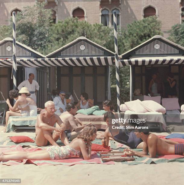 Backgammon on the beach at the Hotel Excelsior on the Venice Lido, Italy, 1957.