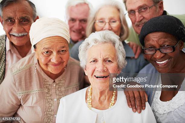 enjoying their retirement - group of seniors stock pictures, royalty-free photos & images