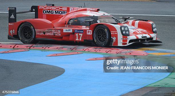 New Zealand's Brendon Hartley drives his Porsche 919 - Hybrid N°17 on May 31, 2015 during the test day of the 83rd Le Mans 24-hour endurance race in...