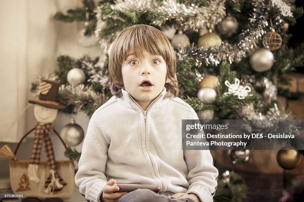 Christmas surprised boy