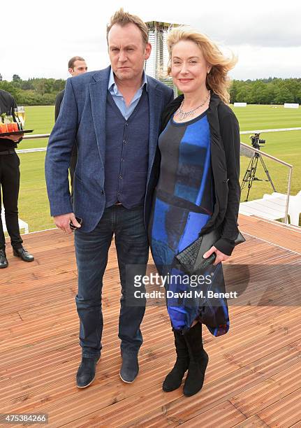 Phil Glenister and Beth Goddard attend day two of the Audi Polo Challenge at Coworth Park on May 31, 2015 in London, England.