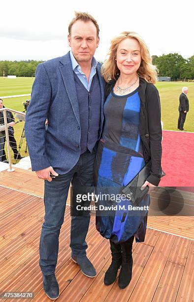 Phil Glenister and Beth Goddard attend day two of the Audi Polo Challenge at Coworth Park on May 31, 2015 in London, England.