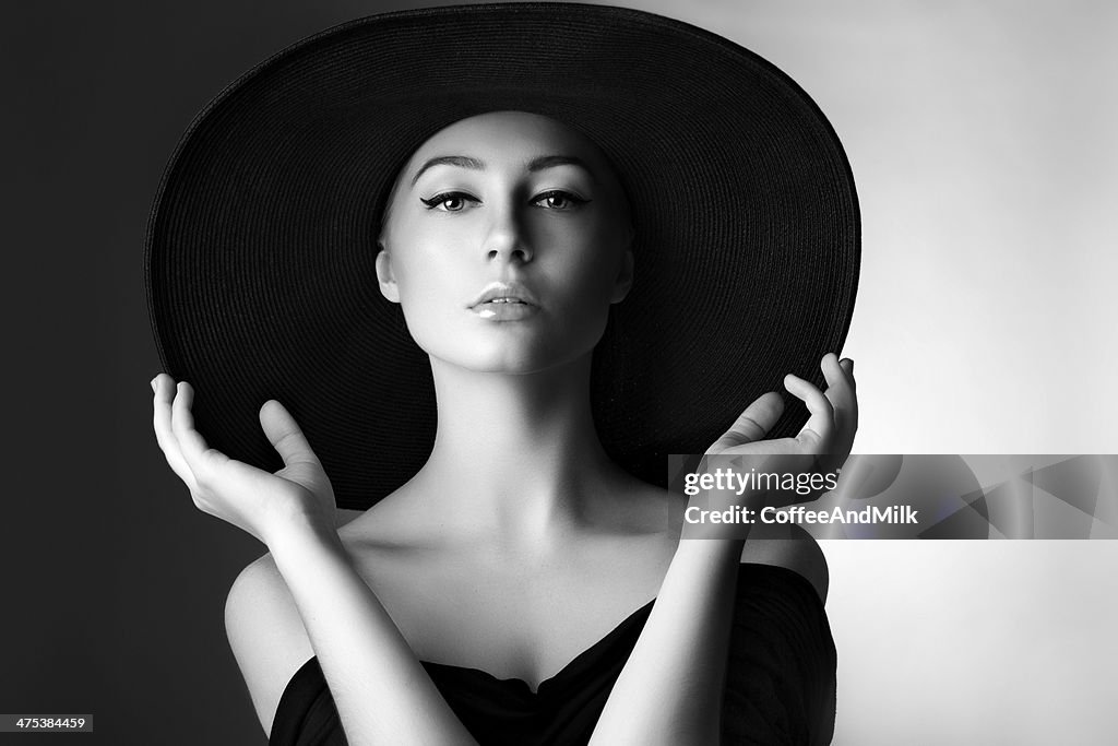 Studio shot of young beautiful woman