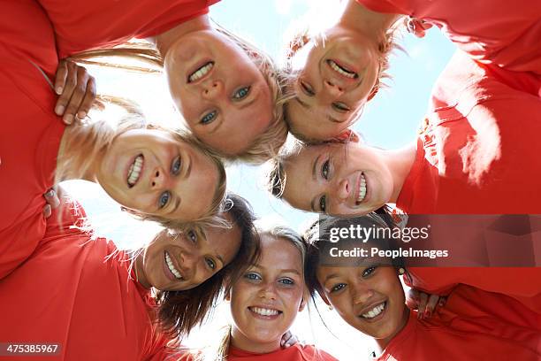 no "i" in team - huddle sport girls stock pictures, royalty-free photos & images