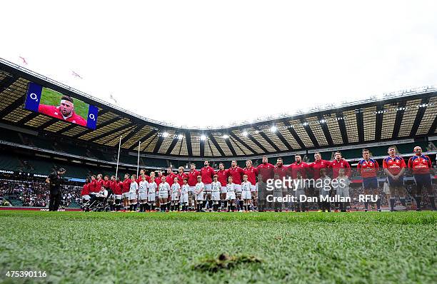 The England team line up for the national anthem during the Rugby Union International Match between England and The Barbarians at Twickenham Stadium...