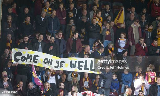 Fans show their support during the Scottish Premiership play-off final 2nd leg between Motherwell and Rangers at Fir Park on May 31, 2015 in...