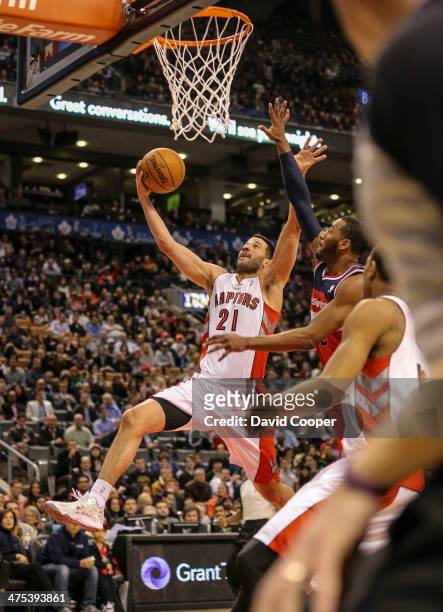 Toronto Raptors point guard Greivis Vasquez goes up to the hoop for two points during the game between the Toronto Raptors and the Washington Wizards...