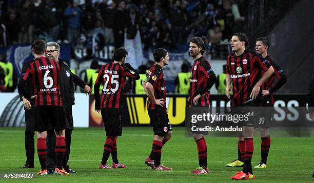 Players of Eintracht Frankfurt react after the UEFA Europa League round of 32 second leg football match between Eintracht Frankfurt and FC Porto in...