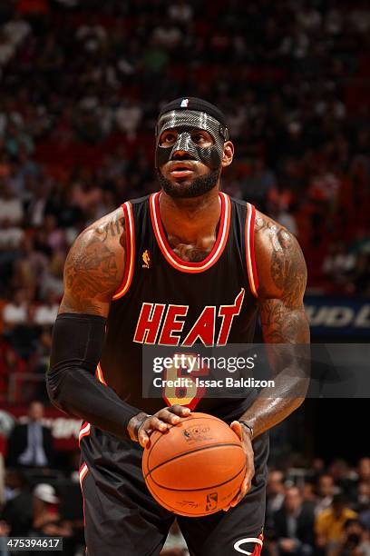 February 27: LeBron James of the Miami Heat takes a free throw during a game against the New York Knicks at the American Airlines Arena in Miami,...