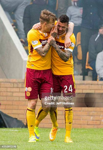 Marvin Johnson celebrates a goal with Lee Erwin of Motherwell during the Scottish Premiership play-off final 2nd leg between Motherwell and Rangers...