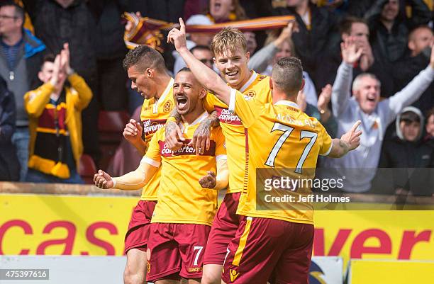 Lionel Ainsworth of Motherwell celebrates his goal making it 2:0 with team mates during the Scottish Premiership play-off final 2nd leg between...