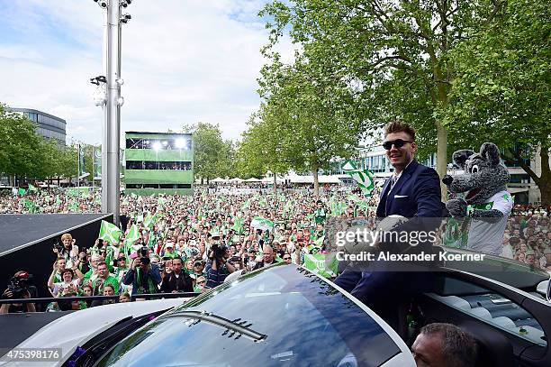 Team member of VfL Wolfsburg, Robin Knoche, arrives at Rathausplatz to celebrate the winning DFB Cup on May 31, 2015 in Wolfsburg, Germany. VfL...