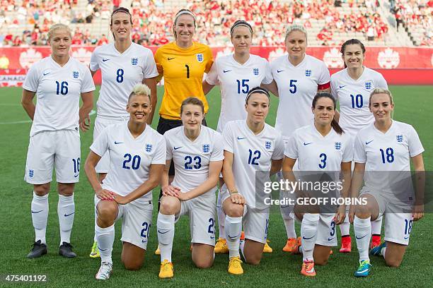 England's starting lineup of, back row from left; Katie Chapman, Jill Scott, Karen Bardsley, Casey Stoney, Steph Houghton, Karen Carney and, front...