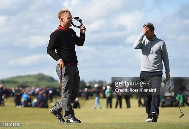 Soren Kjeldsen of Denmark reacts to his victory in a playoff on the 18th green during the Final Round of the Dubai Duty Free Irish Open Hosted by the...