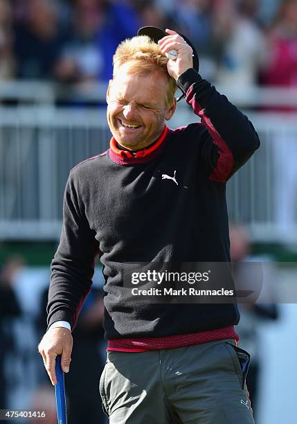 Soren Kjeldsen of Denmark reacts to his victory in a playoff on the 18th green during the Final Round of the Dubai Duty Free Irish Open Hosted by the...