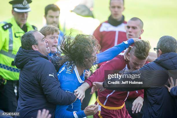 Bilel Mohsni of Rangers clashes with Motherwell players during the Scottish Premiership play-off final 2nd leg between Motherwell and Rangers at Fir...