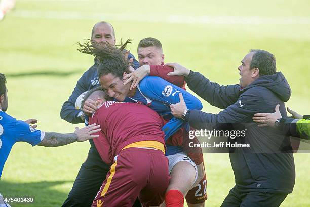 Bilel Mohsni of Rangers clashes with Motherwell players during the Scottish Premiership play-off final 2nd leg between Motherwell and Rangers at Fir...