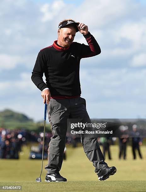 Soren Kjeldsen of Denmark reacts to his victory in a playoff on the 18th green during the Final Round of the Dubai Duty Free Irish Open Hosted by the...