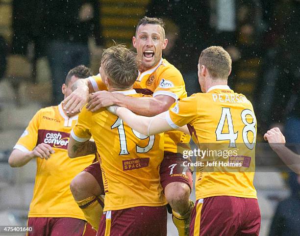 Scott Macdonald celebrates after scoring for Motherwell during the Scottish Premiership play-off final 2nd leg between Motherwell and Rangers at Fir...