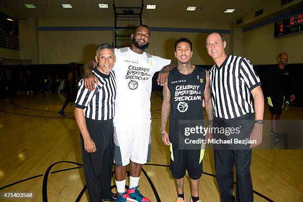 The Game and Tyga attend LA Gear Presents Sports Spectacular Charity Basketball Game Hosted By Tyga on May 30, 2015 in Los Angeles, California.