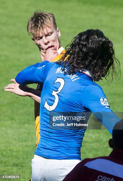 Bilel Mohsni of Rangers clashes with Lee Erwin of Motherwell during the Scottish Premiership play-off final 2nd leg between Motherwell and Rangers at...