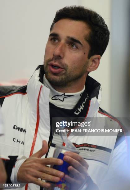 Swiss' Neel Jani looks on after his relay during the first part of the test day of the 83rd Le Mans 24 hours endurance race,during he clocked the...