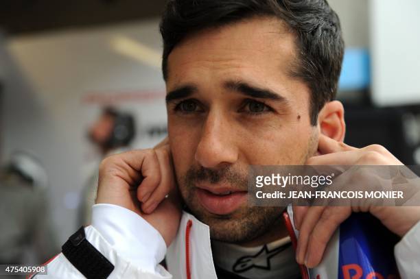 Swiss' Neel Jani gestures after his relay during the first part of the test day of the 83rd Le Mans 24 hours endurance race,during he clocked the...