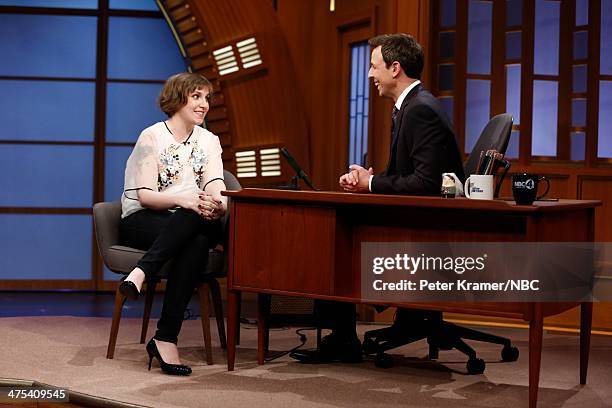 Actress Lena Dunham is interviewed by host Seth Meyers during "Late Night with Seth Meyers" on February 27, 2014 in New York City.