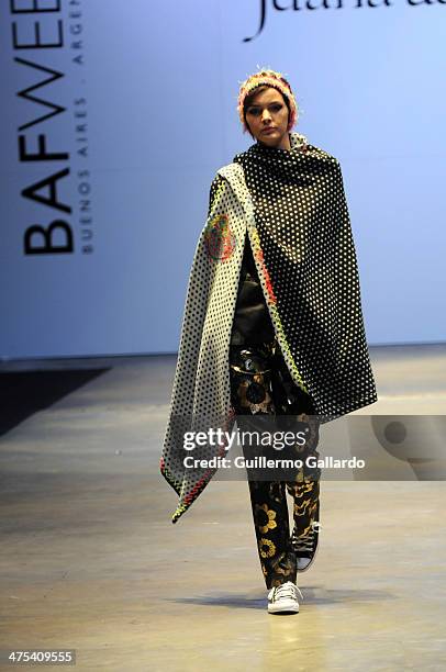 Model walks the runway during Juana de Arco show at the Buenos Aires Fashion Week in Predio Ferial La Rural on February 27, 2014 in Buenos Aires,...