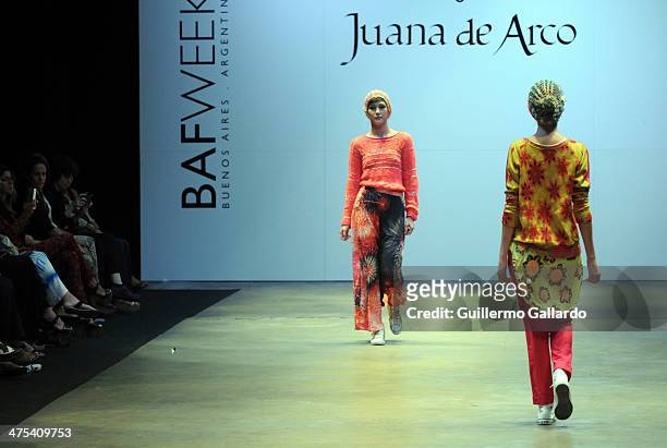 Models walk the runway during Juana de Arco show at the Buenos Aires Fashion Week in Predio Ferial La Rural on February 27, 2014 in Buenos Aires,...