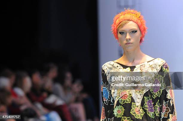 Model walks the runway during Juana de Arco show at the Buenos Aires Fashion Week in Predio Ferial La Rural on February 27, 2014 in Buenos Aires,...