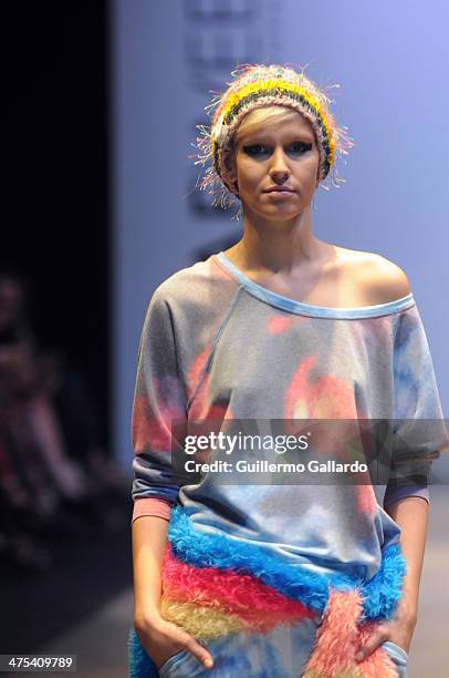 Model walks the runway during Juana de Arco show at the Buenos Aires Fashion Week in Predio Ferial La Rural on February 27, 2014 in Buenos Aires,...