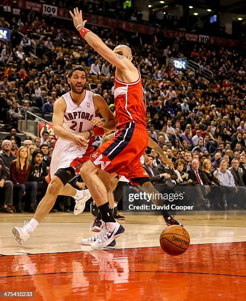 Toronto Raptors point guard Greivis Vasquez tires to pass to Toronto Raptors power forward Tyler Hansbrough under the basket but it was knocked away...